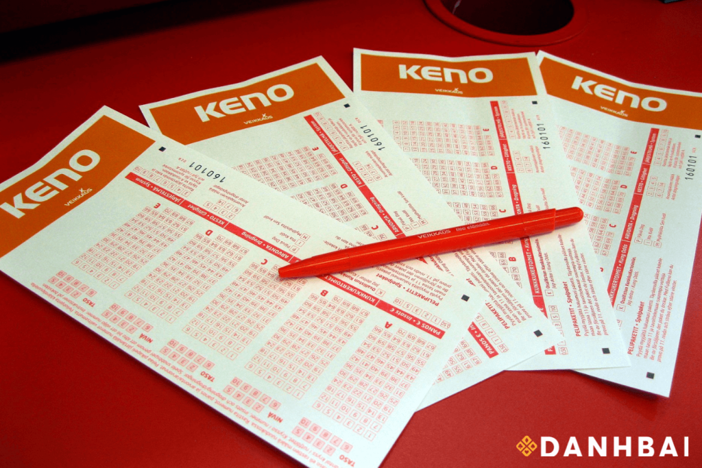 Colorful keno sheets, marked with numbers.